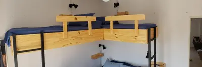 a couple of bunk beds in a room at Dpto s/av Rafael Nuñez - 1 dorm y balcon in Cordoba