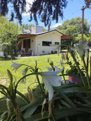 a view of the house from the garden at las brisas casas de campo un lugar para soñar in San Antonio de Arredondo