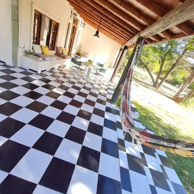 a black and white checkered floor in a house at las brisas casas de campo un lugar para soñar in San Antonio de Arredondo