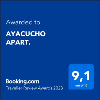 a blue sign with the text awarded to ayaccotota appart at AYACUCHO APART. in Cordoba