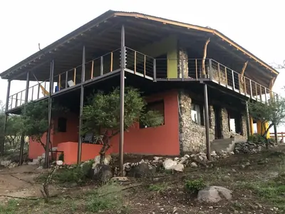a house with a balcony on top of it at ACHIRAS SUNSET in San Javier