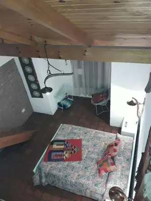 an overhead view of a room with a bed and a table at Lola Maria Apart in Villa General Belgrano