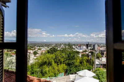 a view of a city from a window at del Buen Ayre in Villa Carlos Paz