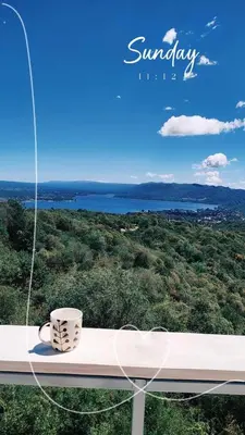 a coffee cup sitting on a window sill with a view at TERRAZAS DE LA COMARCA in La Cuesta