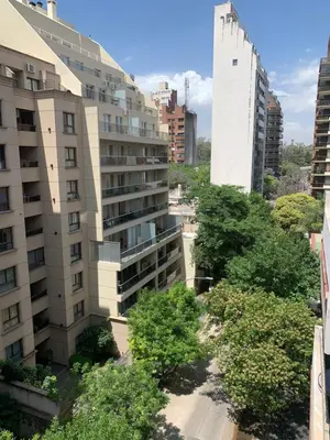 a view of a city with buildings and trees at Chile 210, Nueva Cordoba in Cordoba