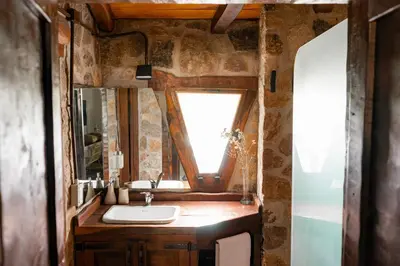 a bathroom with a sink and a mirror at Gardenia Select in San Javier