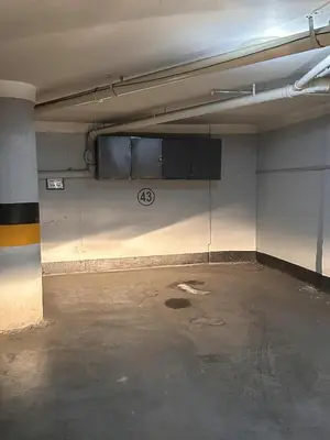 an empty parking garage with an empty parking lot at Departamento Villa Carlos Paz Miralejos 3 in Villa Carlos Paz