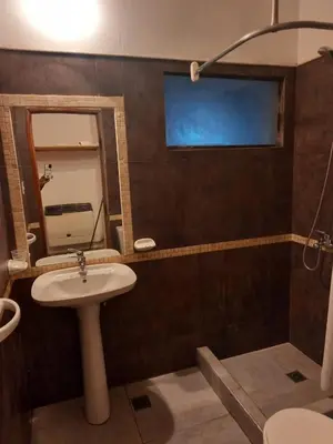 a bathroom with a sink and a mirror at Chalet Centrico in Merlo