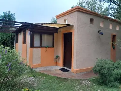 a small house with a door in a yard at Architerra in San Javier