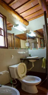 a bathroom with a toilet and a sink at Architerra in San Javier
