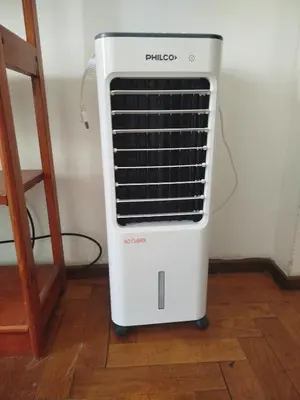 a air conditioner sitting on a floor in a room at Departamento Alberdi Little in Cordoba