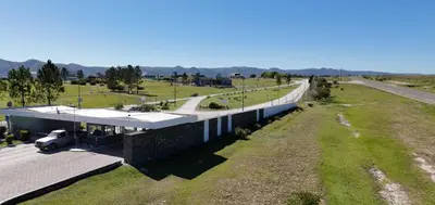 an overhead view of a building with a road next to it at Casa Puerto del Aguila - Potrero de Garay in Potrero de Garay
