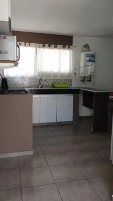 a kitchen with a sink and a counter top at Los Ceibos dpto para 4 personas in Estancia Vieja