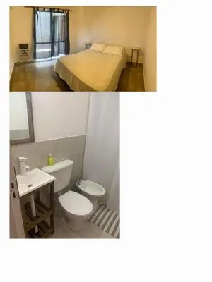 a bathroom with a bed and a toilet and a sink at Departamentos Talamuchita in Santa Rosa de Calamuchita