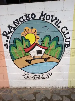 a wall with a painting of a sign on it at Cabaña en el lago in Trapiche