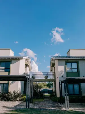 a building with a walkway in front of it at Aires de Sierra in Merlo