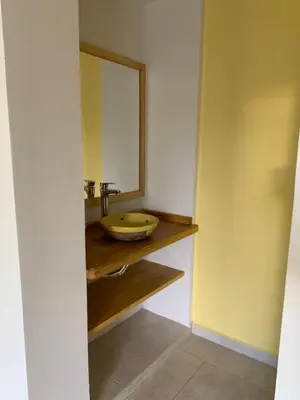 a bathroom with a sink and a mirror at Aires de Sierra in Merlo