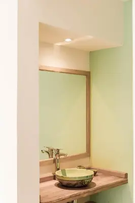a bathroom with a sink and a mirror at Aires de Sierra in Merlo