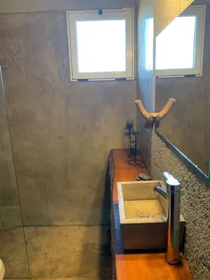 a bathroom with a sink and a window at Yacanto360 in Villa Yacanto