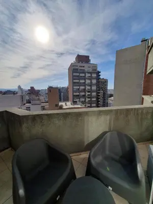 two toilets on a balcony with a view of a city at Premium appart LOCADOR Nueva Cordoba14C in Cordoba