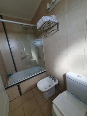 a bathroom with a shower and a toilet and a sink at Premium appart LOCADOR Nueva Cordoba14C in Cordoba