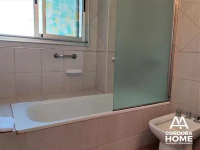 a bathroom with a bath tub and a sink at A&A Cordoba Home - Duplex Boutique en Nueva Cordoba in Cordoba