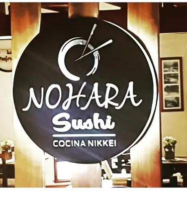 a sign for a restaurant with a clock on a wall at Hotel Boutique Spa & Sushi Posada de Campo-Solo adultos in Villa General Belgrano