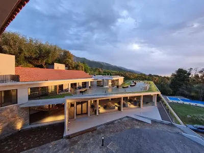 an aerial view of a house with a roof at Hotel Estilo MB - Merlo in El Rincón