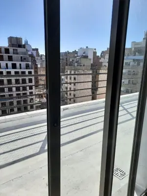 a view of a city from a window at Departamento en Nueva Córdoba in Cordoba