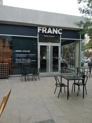 a wine house with tables and chairs in front of it at Confortable en Cofico in Cordoba