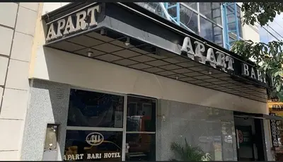 a store front of a car shop with a sign on it at Apart Hotel Bari in Cordoba