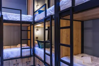 a group of bunk beds in a room at Faz Hostel Boutique in Cordoba