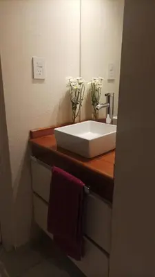 a bathroom counter with a sink and a mirror at Cofico Ideal in Cordoba