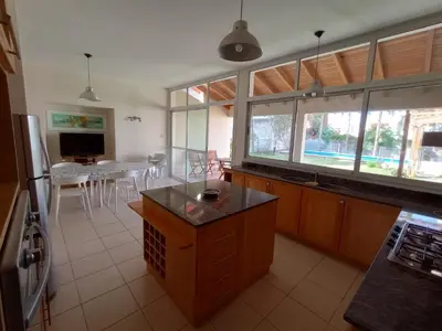 a kitchen and dining room with a table and chairs at Casa Lucerna in Cordoba