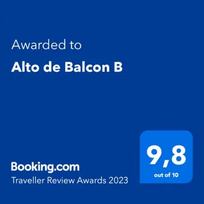 a blue cell phone with the text awarded to abiotic b billion at Alto de Balcon B in Tanti