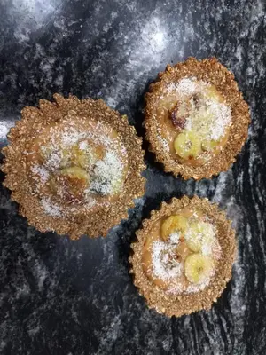 three muffins with sugar on top on a table at Alto de Balcon B in Tanti