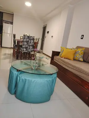 a living room with a couch and a coffee table at Apartamento Carlos Paz in Villa Carlos Paz