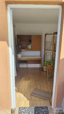 a view of a living room with a bench at Makipura in Cordoba