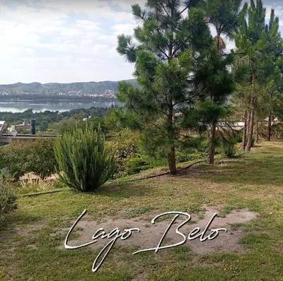 a sign that says open lets with a pine tree at Lago Belo in Cordoba
