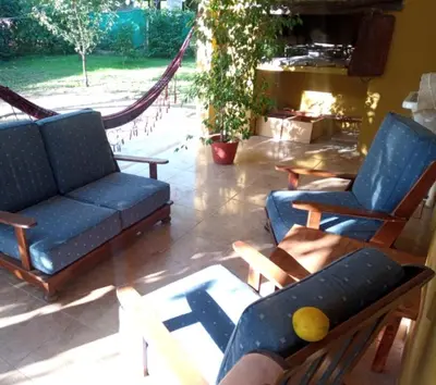 a living room with two chairs and a couch at Casa en Las Tapias cerca de Villa de Las Rosas in San Javier