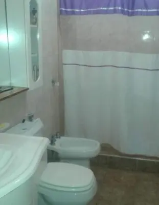 a bathroom with a white toilet and a sink at Casa en Las Tapias cerca de Villa de Las Rosas in San Javier