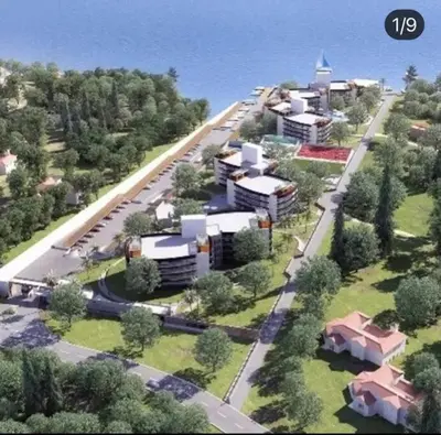 a rendering of a city with a road and buildings at Departamento con vista al lago en Veneto Village in Villa Parque Siquiman