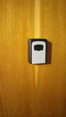 a black and white toaster hanging on a wall at Dpto Temporario Córdoba, ubicación ideal in Cordoba