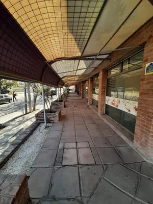 an empty hallway of a building with a ceiling at ALTOS DE VILLA CABRERA in Cordoba