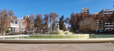 a fountain in the middle of a city at Luminoso departamento con vista! in Cordoba