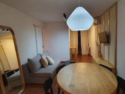 a living room with a couch and a table at LOAN Nueva Cordoba 6A in Cordoba