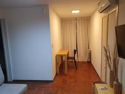 a room with a desk and a chair in a room at LOAN Nueva Cordoba 6A in Cordoba