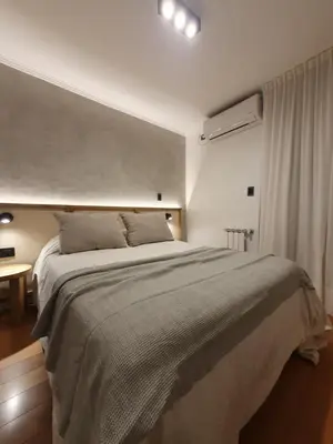 a bedroom with a large bed in a room at LOAN Nueva Cordoba categoría appart 7B in Cordoba