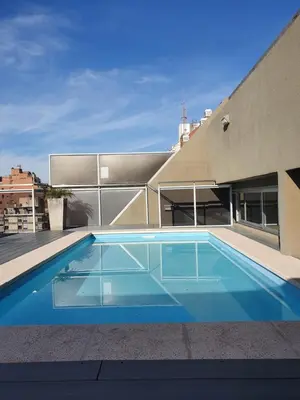 a swimming pool on the roof of a building at LOAN Nueva Cordoba categoría appart 7B in Cordoba