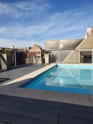 a swimming pool on the roof of a house at LOAN Nueva Cordoba categoría appart 7B in Cordoba